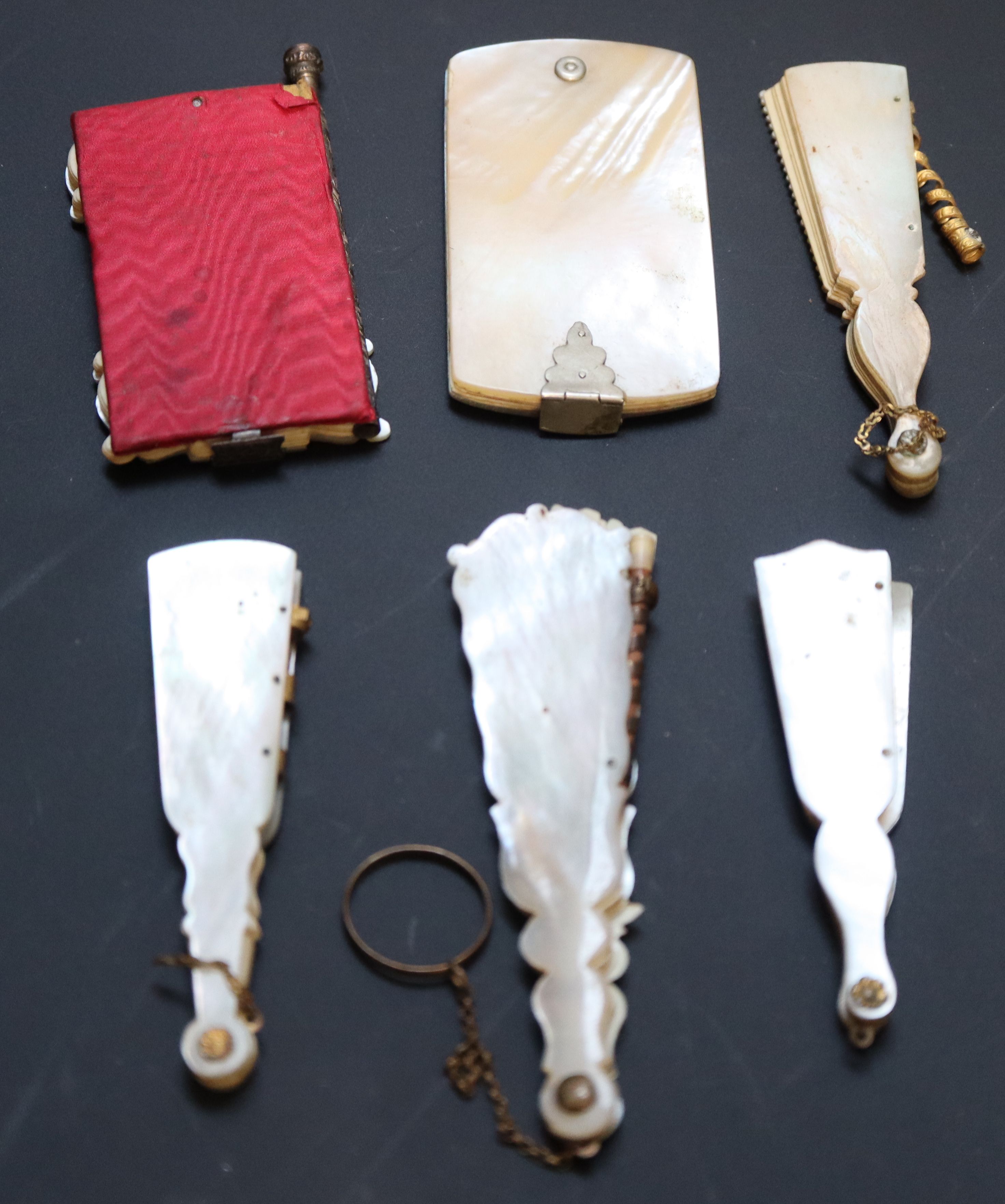 Six 19th century Palais Royale mother of pearl mounted dance cards and note cases largest 9cm